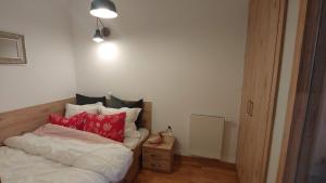 Letto o letti in una camera di Apartamenty Czerwone Maki Wisła