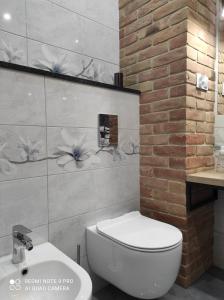 Kúpeľňa v ubytovaní MAZURSKA DAMA LUXURY APARTAMENT + 32 fotografií