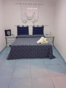 A bed or beds in a room at Da Lucia - Alloggio turistico Santa Maria