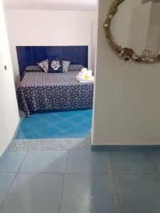 A bed or beds in a room at Da Lucia - Alloggio turistico Santa Maria