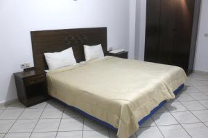 Кровать или кровати в номере Hotel Yassmina