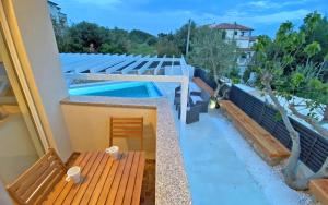 Fotografia z galérie ubytovania Pakostane - JUSTINA - appartement 80 m2 et piscine v Pakoštane