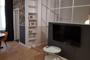 TV a/nebo společenská místnost v ubytování Złoty Flaming