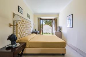 Postel nebo postele na pokoji v ubytování Hotel Lido degli Scogli