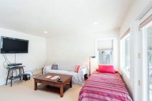 a living room with a bed and a couch at Colorado East 735 - Idlewood East in Telluride