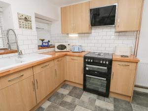 Køkken eller tekøkken på Cloverleaf Cottage