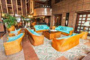 Uma área de estar em GHL Hotel Sunrise