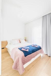 Posteľ alebo postele v izbe v ubytovaní Apartament Nad Potokiem Skrzyczne Residence