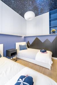 Posteľ alebo postele v izbe v ubytovaní Apartament Nad Potokiem Skrzyczne Residence