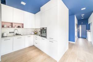 Kuchyňa alebo kuchynka v ubytovaní Apartament Nad Potokiem Skrzyczne Residence