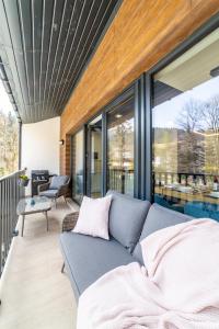 Bazén v ubytovaní Apartament Nad Potokiem Skrzyczne Residence alebo v jeho blízkosti