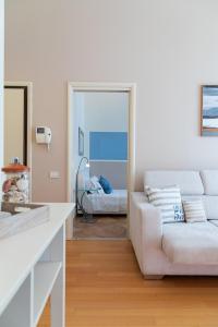 A bed or beds in a room at Zara D'Amare a Pesaro 10 metri dalla spiaggia by Yohome