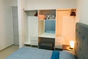 Ένα ή περισσότερα κρεβάτια σε δωμάτιο στο Puerto Morelos - House to enjoy Riviera Maya +27 φωτογραφίες