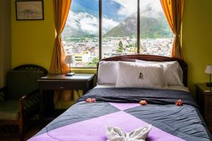 Voodi või voodid majutusasutuse Hosteria Llanovientos toas