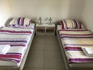 Fotografia z galérie ubytovania Apartment in Lopar with sea view, terrace, air conditioning, Wi-Fi (4607-3) v destinácii Lopar