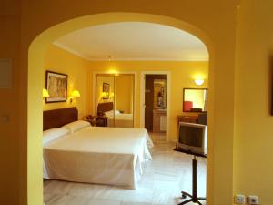 Un pat sau paturi într-o cameră la Villa Albero