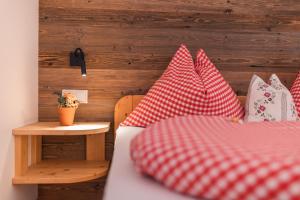 Postel nebo postele na pokoji v ubytování Hotel Appartement Haus Gitschberg