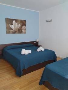 Ένα ή περισσότερα κρεβάτια σε δωμάτιο στο Magnolia Room & Breakfast +63 φωτογραφίες