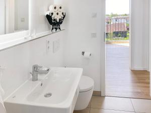 Un baño de Modern & Stylisch: Maisonette Wohnung in Freising