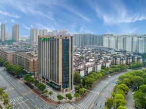 an aerial view of a city with a tall building at Holiday Inn Express Changsha Shengfu, an IHG Hotel in Changsha