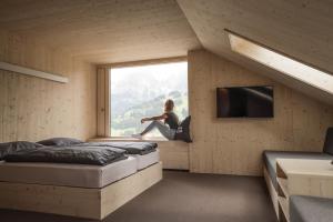 TV a/nebo společenská místnost v ubytování Revier Mountain Lodge Adelboden