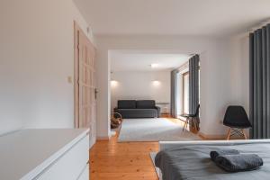 Postel nebo postele na pokoji v ubytování Apartamenty nad Potokiem