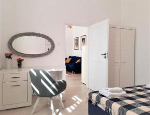 Łóżko lub łóżka w pokoju w obiekcie Apartamenty Jantar