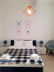 Łóżko lub łóżka w pokoju w obiekcie Apartamenty Jantar