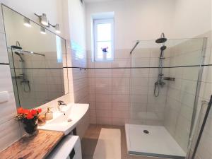 Łazienka w obiekcie Apartamenty Jantar