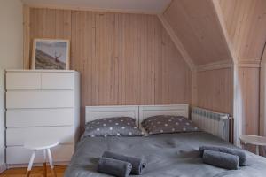 Postel nebo postele na pokoji v ubytování Apartamenty nad Potokiem