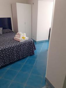 A bed or beds in a room at Da Lucia - Alloggio turistico Santa Maria