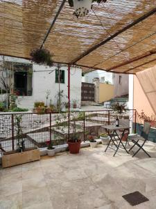 A balcony or terrace at The Village Cottage - Benitses Még 31 kép
