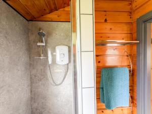 Kylpyhuone majoituspaikassa Avallon Lodges