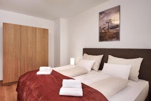 Postel nebo postele na pokoji v ubytování die Tauplitz Lodges - Alm Lodge A2 by AA Holiday Homes