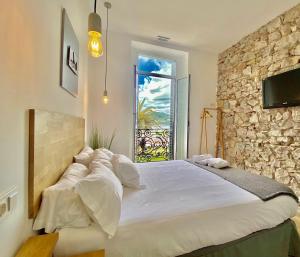 Posteľ alebo postele v izbe v ubytovaní Mirandoalaconcha Rooms