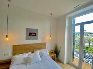 Posteľ alebo postele v izbe v ubytovaní Mirandoalaconcha Rooms
