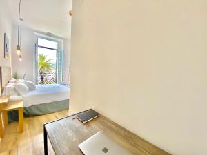 Posteľ alebo postele v izbe v ubytovaní Mirandoalaconcha Rooms