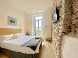 Posteľ alebo postele v izbe v ubytovaní Mirandoalaconcha Rooms