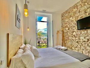 Posteľ alebo postele v izbe v ubytovaní Mirandoalaconcha Rooms