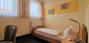 Postel nebo postele na pokoji v ubytování Hotel Seehalde