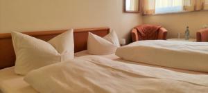 Postel nebo postele na pokoji v ubytování Hotel Seehalde