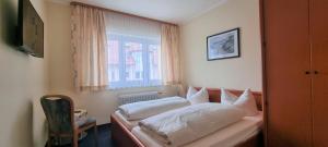 Postel nebo postele na pokoji v ubytování Hotel Seehalde