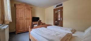 Postel nebo postele na pokoji v ubytování Hotel Seehalde