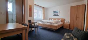 Postel nebo postele na pokoji v ubytování Hotel Seehalde