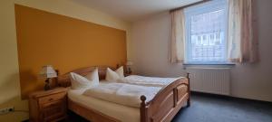 Postel nebo postele na pokoji v ubytování Hotel Seehalde