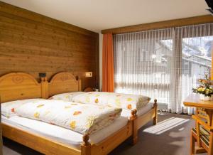 Cama ou camas em um quarto em Ambiente Guesthouse