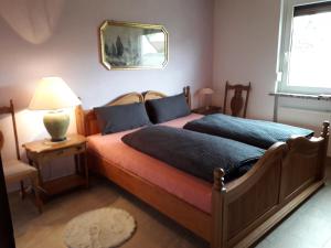 Postel nebo postele na pokoji v ubytování Heidehaus Hodenhagen