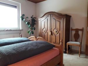 Postel nebo postele na pokoji v ubytování Heidehaus Hodenhagen