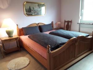 Ένα ή περισσότερα κρεβάτια σε δωμάτιο στο Heidehaus Hodenhagen