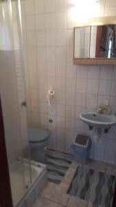 Kúpeľňa v ubytovaní Kitti Vendégház